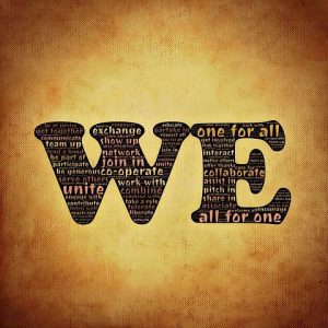 The word 'WE' on a beige background