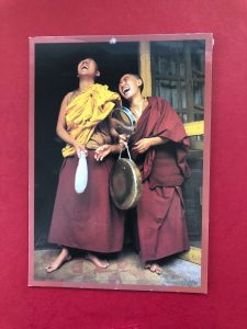two Tibetan nuns laughing