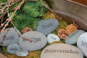 flat rocks with words on them - truth, faith, courage, joy, love, etc.