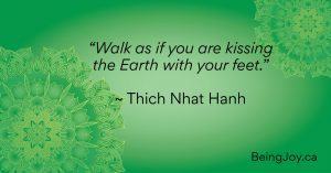 Quote over green mandala - “Walk as if you are kissing the Earth with your feet.” ~ Thich Nhat Hanh